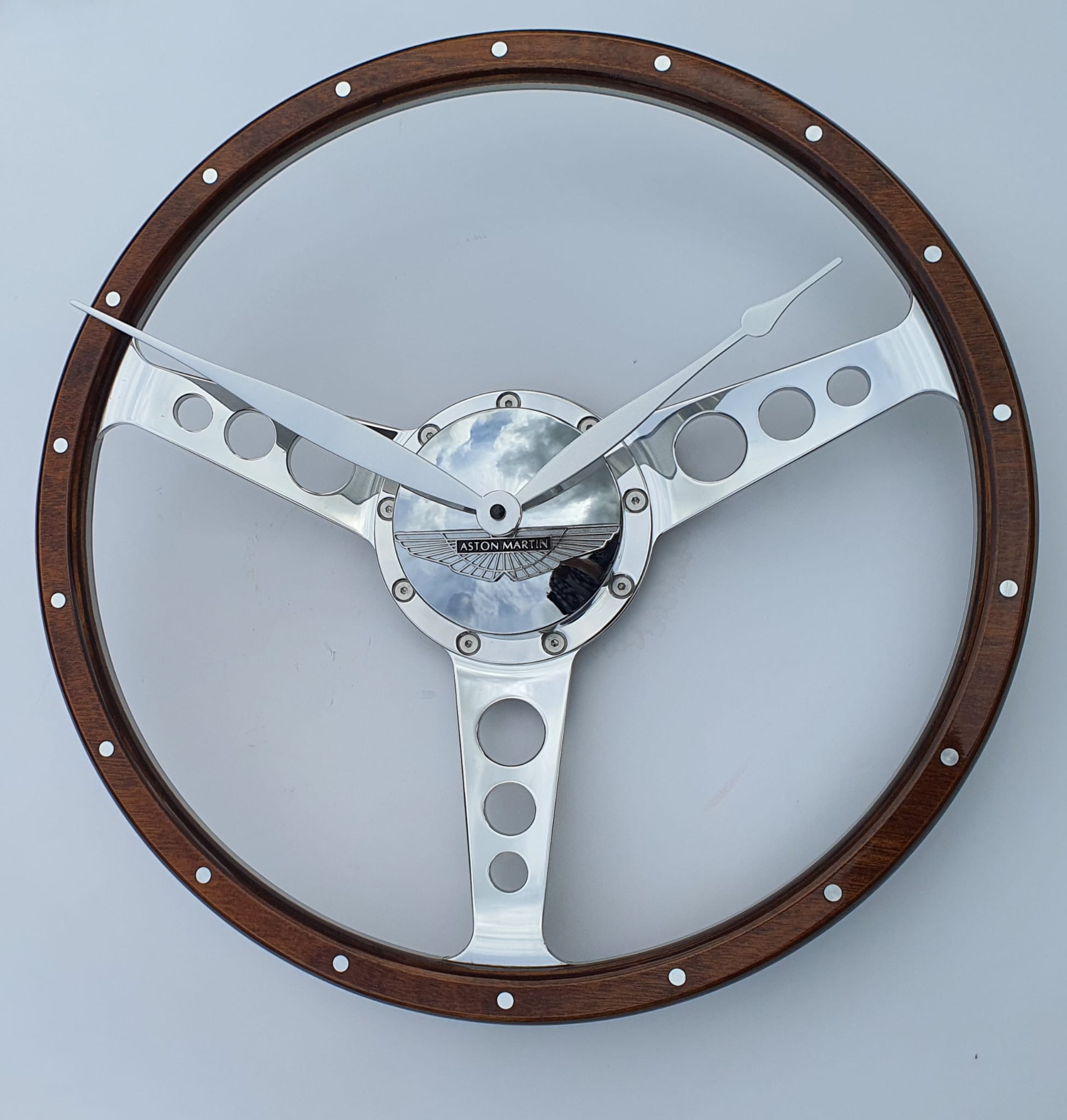 Classic car polished wooden steering wheel clock. Customers choice of car badge.