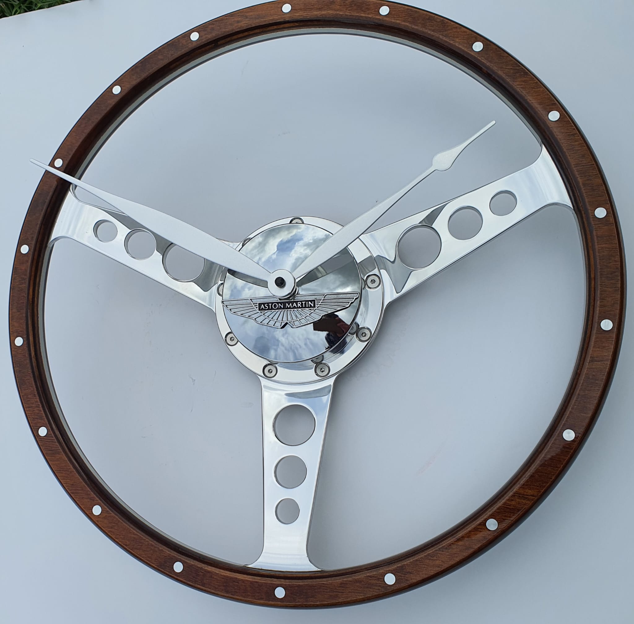 Classic car polished wooden steering wheel clock. Customers choice of car badge.