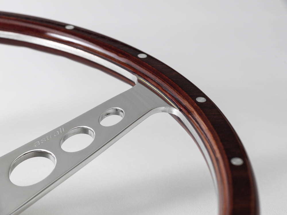 Classic car polished wooden steering wheel clock. Customers choice of car badge.