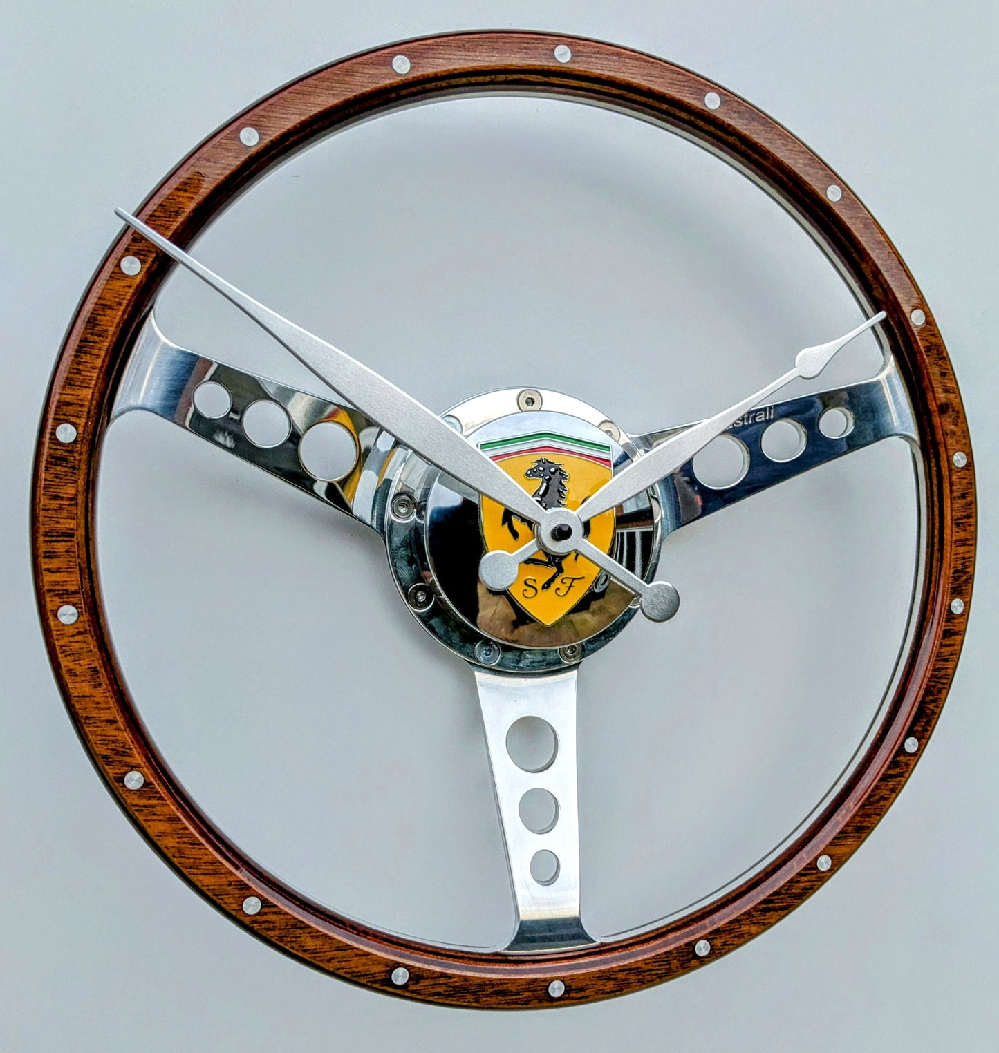 Classic car polished wooden steering wheel clock. Customers choice of car badge.